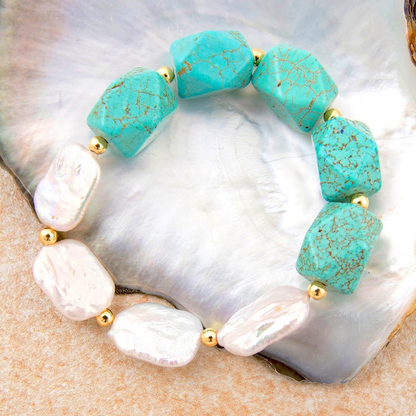 Start2Finish Hepburn Blue Magnesite and Pearl chunky stretch bracelet with gold accents, featuring blue magnesite beads and pearl details.