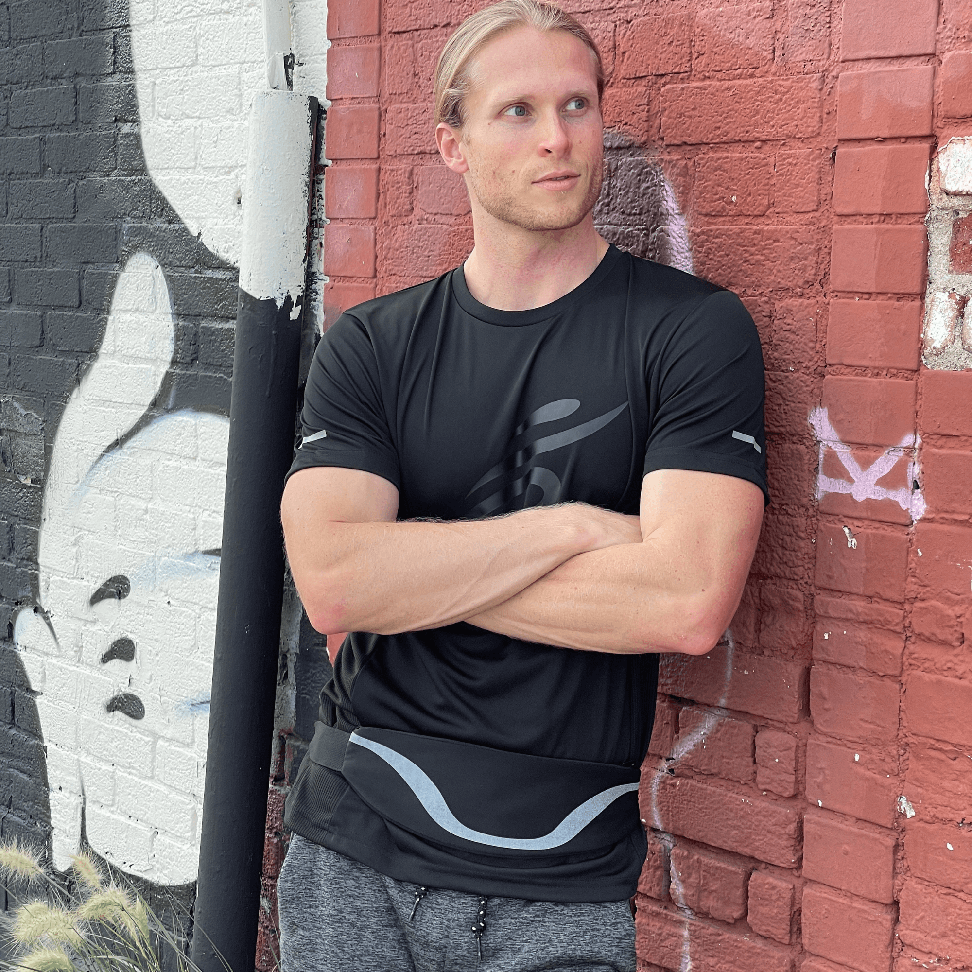 Black Lavender water-resistant sport waist pack with reflective strip, ideal for running and outdoor activities.