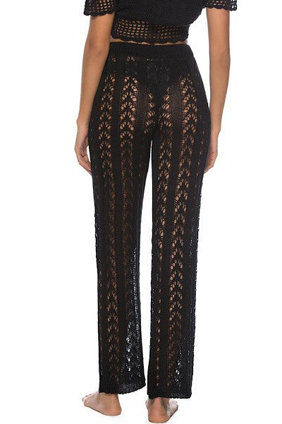 Knit cover-up pants by Jade Icarus, designed for automotive use, featuring a soft, textured fabric and relaxed fit.