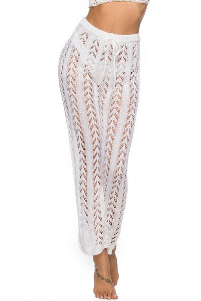 Knit cover-up pants by Jade Icarus, featuring a cozy, textured knit fabric and relaxed fit for comfortable wear.