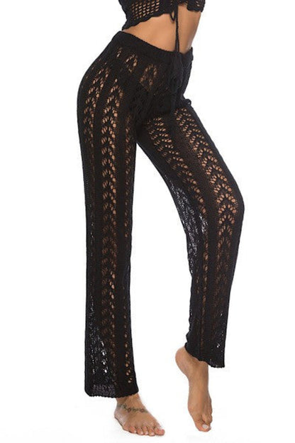 Knit cover-up pants by Jade Icarus, featuring a cozy, stylish design with a relaxed fit suitable for casual wear.