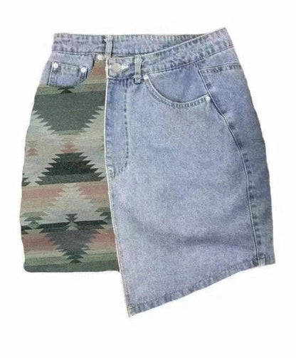 Automotive denim skirt by Jade Icarus featuring detailed stitching and a casual, stylish design with a front slit and belt loops.