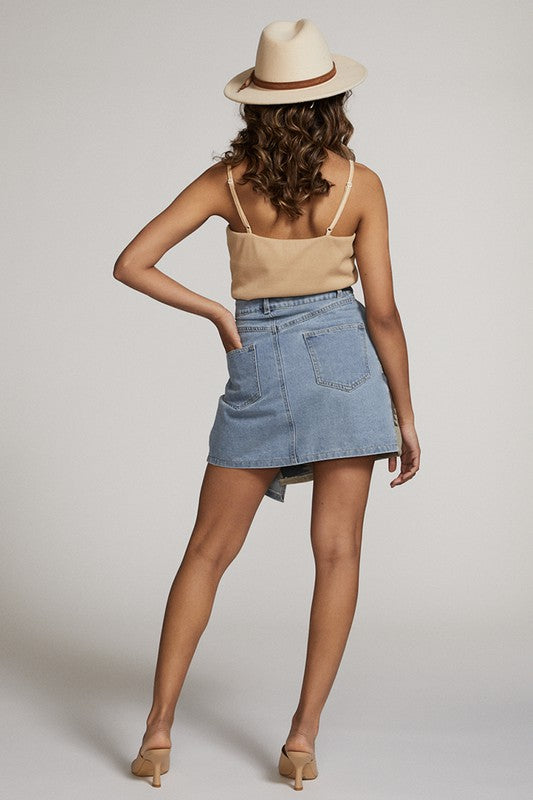Jade Icarus denim skirt designed for automotive style, featuring a stylish denim fabric and tailored fit.