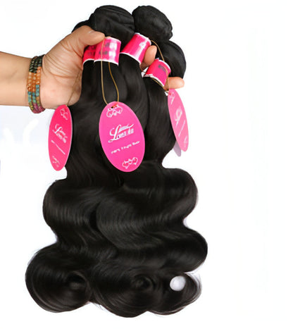 Carmine Juneberry EternaWave Brazilian wave hair wig showing long, wavy hair with natural shine and layered style.