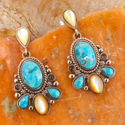Start2Finish Barcelona blue turquoise and caramel mother-of-pearl post earrings with intricate jewelry design and vibrant color details.