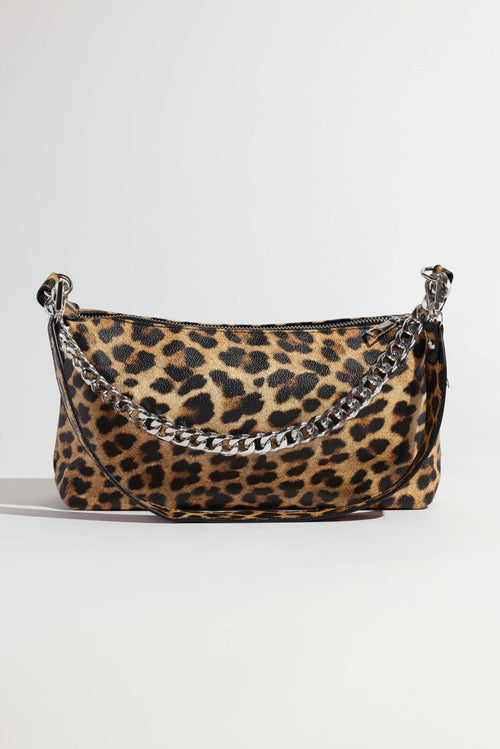 Lavender Tartarus leopard print crossbody handbag with adjustable strap and gold-tone hardware, stylish and versatile accessory.