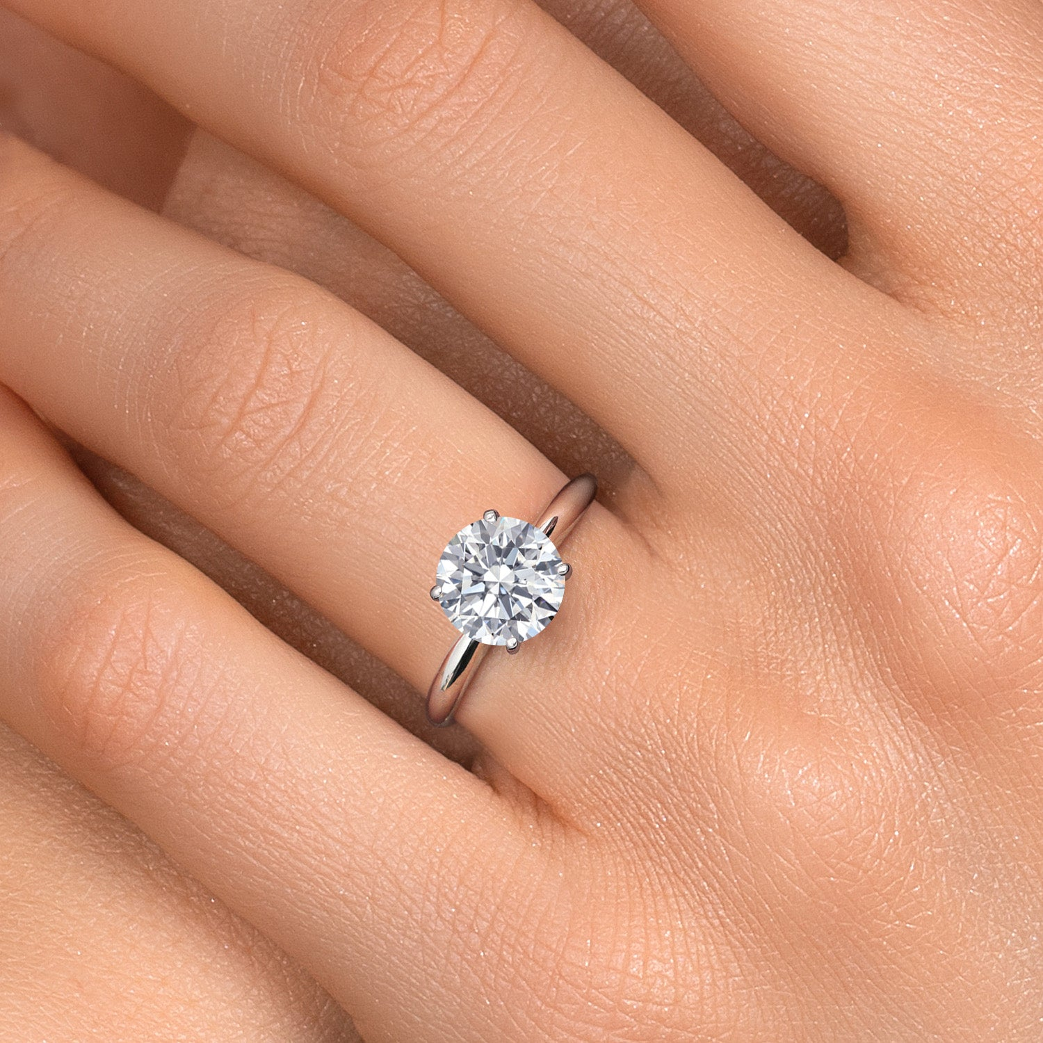 Round lab-grown diamond solitaire engagement ring with 3.50 CTW in 14K white gold, F/VS, AGI certified, shown from top view