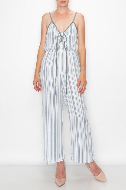 Blue front tie cropped jumpsuit by Yellow Hera, stylish clothing with a fitted waist and trendy design, shown on a model.