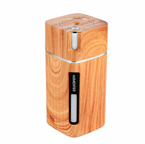 Maroon Asteria ultrasonic air humidifier with USB power, mini mist maker, and LED light for home improvement.