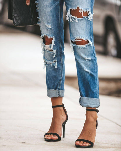 Carmine Juneberry large ripped jeans with distressed detailing and relaxed fit, showcasing casual denim style.