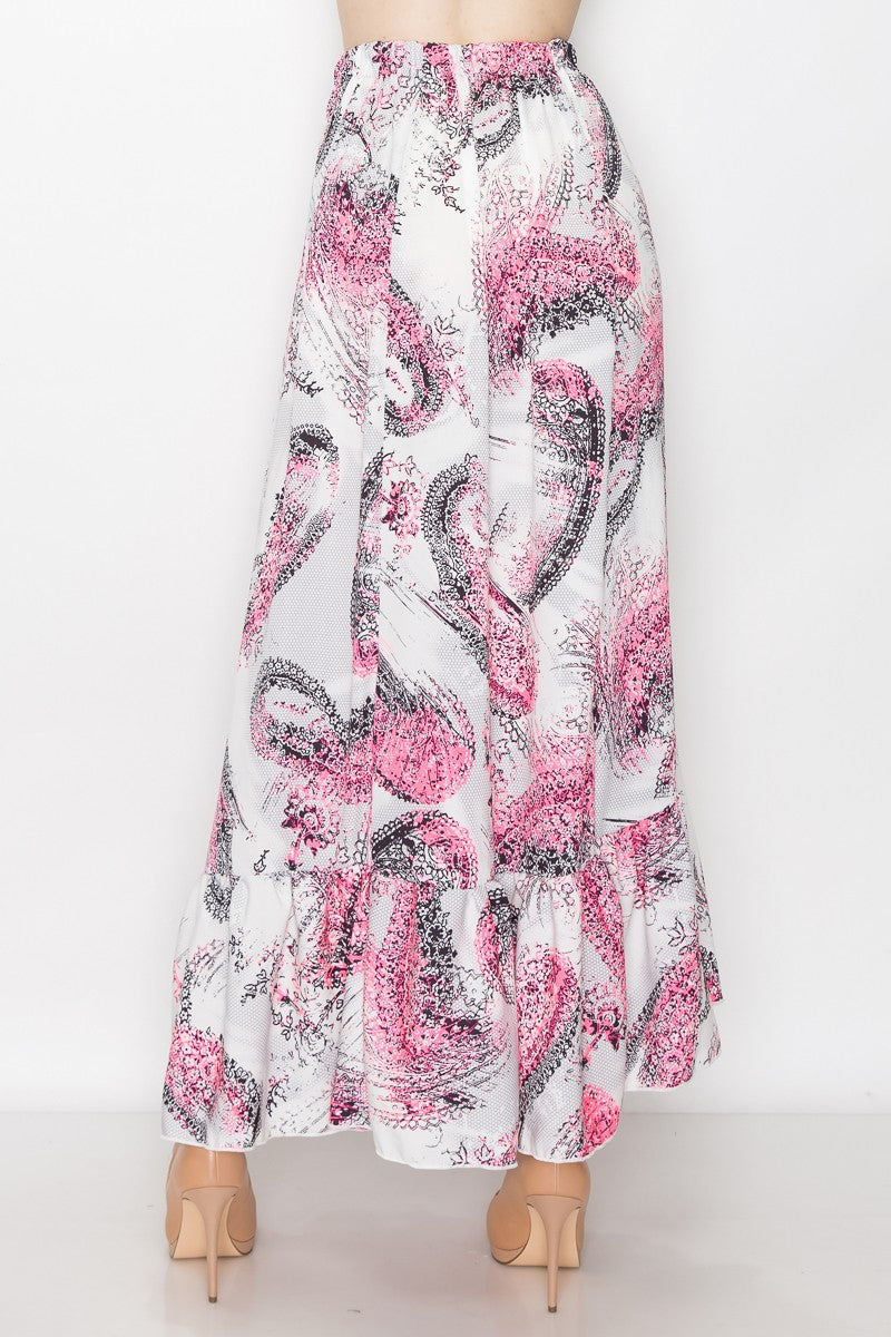 Pink paisley print long skirt with flared bottom from Yellow Hera, showcasing flowing fabric and stylish design.