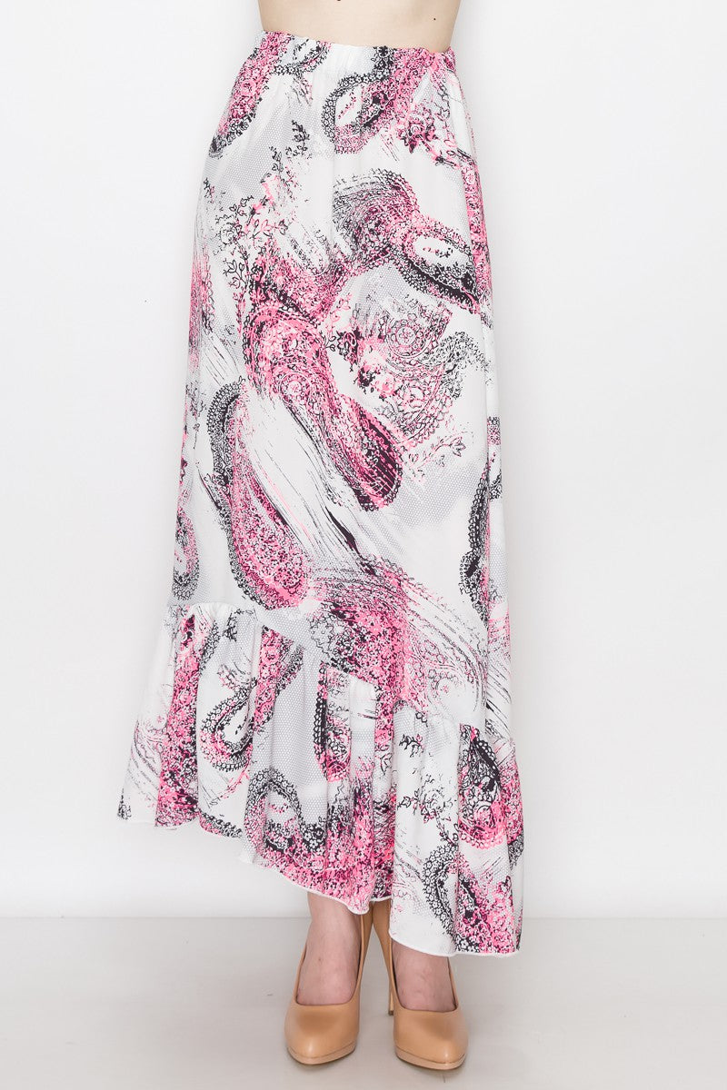Pink paisley print long skirt with flared bottom by Yellow Hera, featuring a flowing, bohemian-inspired dress design.