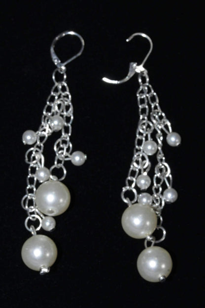 Silver Hestia Pearls &amp; Chains Dangle Earrings showcasing elegant pearl beads and delicate chain design.