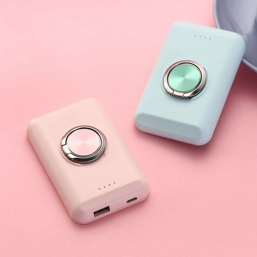 Salmon Lucky wireless magnetic charger and power bank for iPhone 12, showing the compact device with magnetic attachment and charging port.