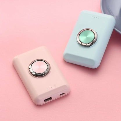 Salmon Lucky wireless magnetic charger and power bank for iPhone 12, showing the compact device with magnetic attachment and charging port.