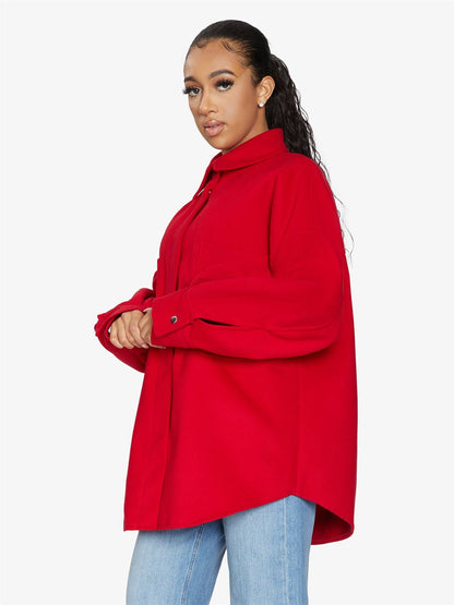 Rose Eleusis oversized patch pocket shacket featuring a relaxed fit, button closure, and classic jacket style in neutral fabric.