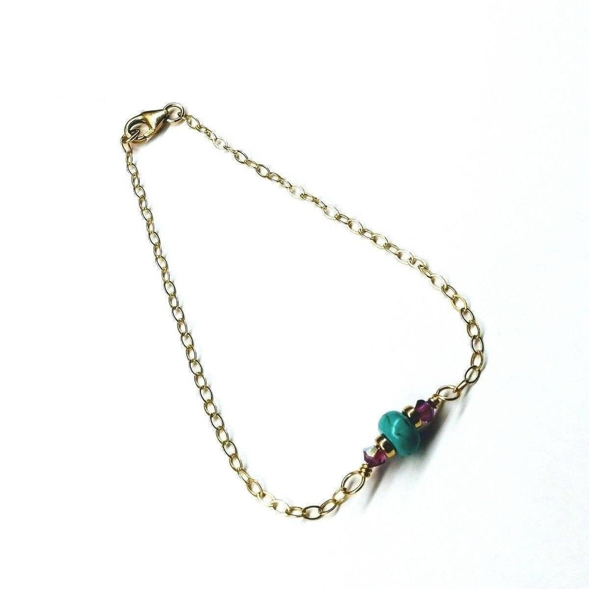 14K gold filled pink and turquoise gemstone dainty bracelet with delicate chain and gemstone accents.