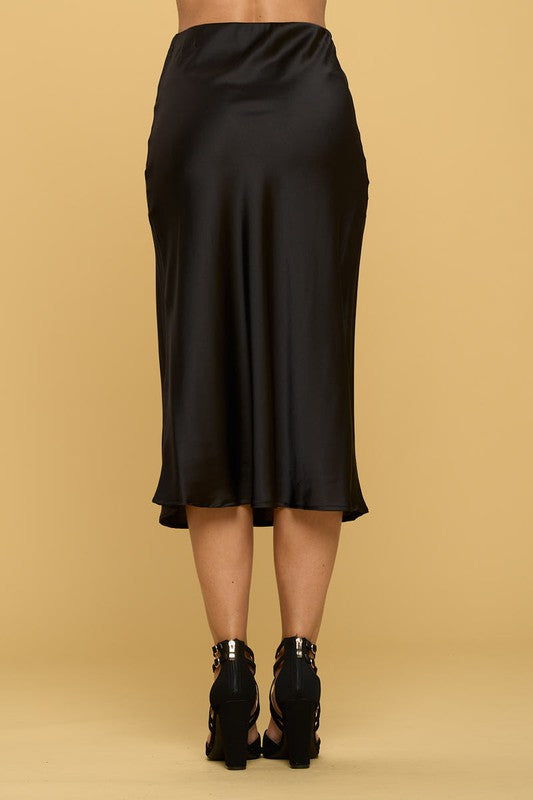 Automotive Jade Icarus Solid Satin Midi Skirt in a sleek, shiny satin fabric with a midi length and smooth finish.