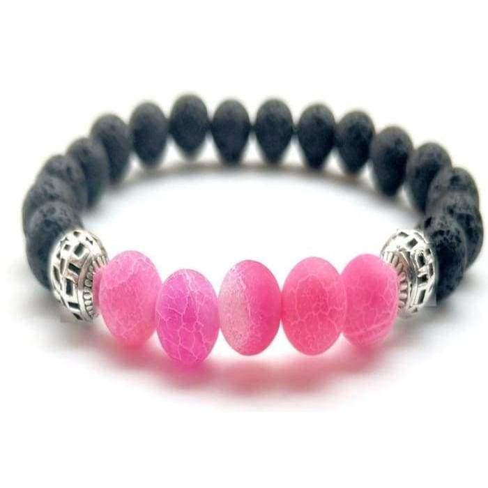 Pink lava stone essential oil bracelet from Start2Finish jewelry featuring round pink lava beads on elastic cord.