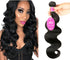 Carmine Juneberry EternaWave Brazilian wave hair wig with soft, flowing curls, showcasing natural Brazilian wave texture and rich color.