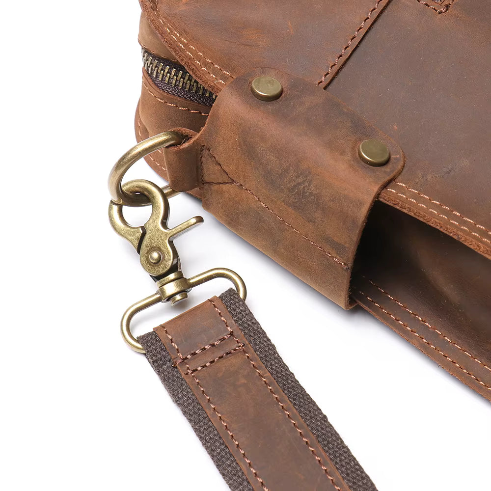 Start2Finish Viggo Briefcase made of genuine leather, featuring a sleek messenger bag design with a front flap and adjustable strap.