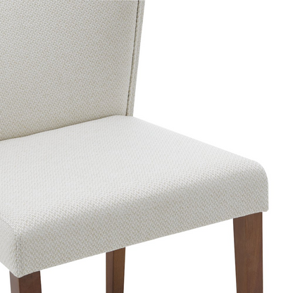 Two Start2Finish Albie fabric dining side chairs with wooden legs, featuring cushioned seats and backrests for comfortable dining.