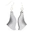 Red Sunflower geometric wave earrings featuring modern, abstract metal design with flowing curves and angular shapes.