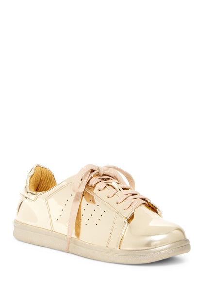 Azure Ophion gold footwear with sleek design and textured details, displayed in a close-up image highlighting the stylish appearance.