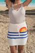 Automotive Sunset Knit Skirt by Jade Icarus featuring a vibrant, sunset-inspired knit pattern and fitted design.