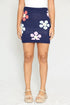 Automotive flower sweater skirt by Jade Icarus featuring floral pattern and cozy knit fabric, displayed on a mannequin.