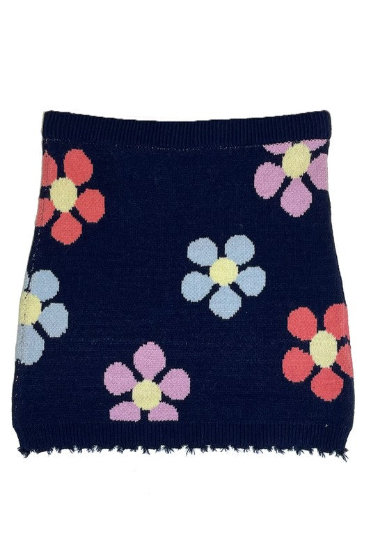 Flower sweater skirt from Jade Icarus, featuring a floral print on a cozy, knitted automotive-inspired fabric.