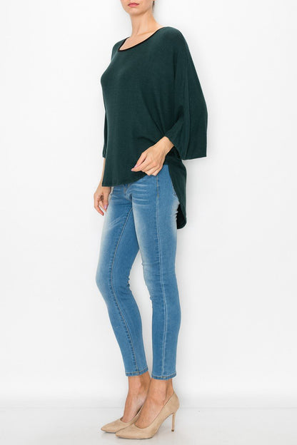 Green high and low round neck tunic top by Yellow Hera, stylish casual dress with a relaxed fit and contrasting hem detail.