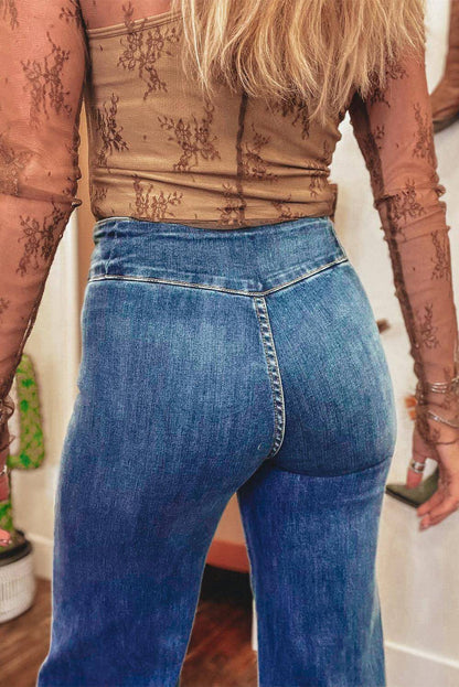 Carmine Juneberry Sail Blue high waist flare jeans with button fly, seamed details, and raw hem for a stylish denim look.