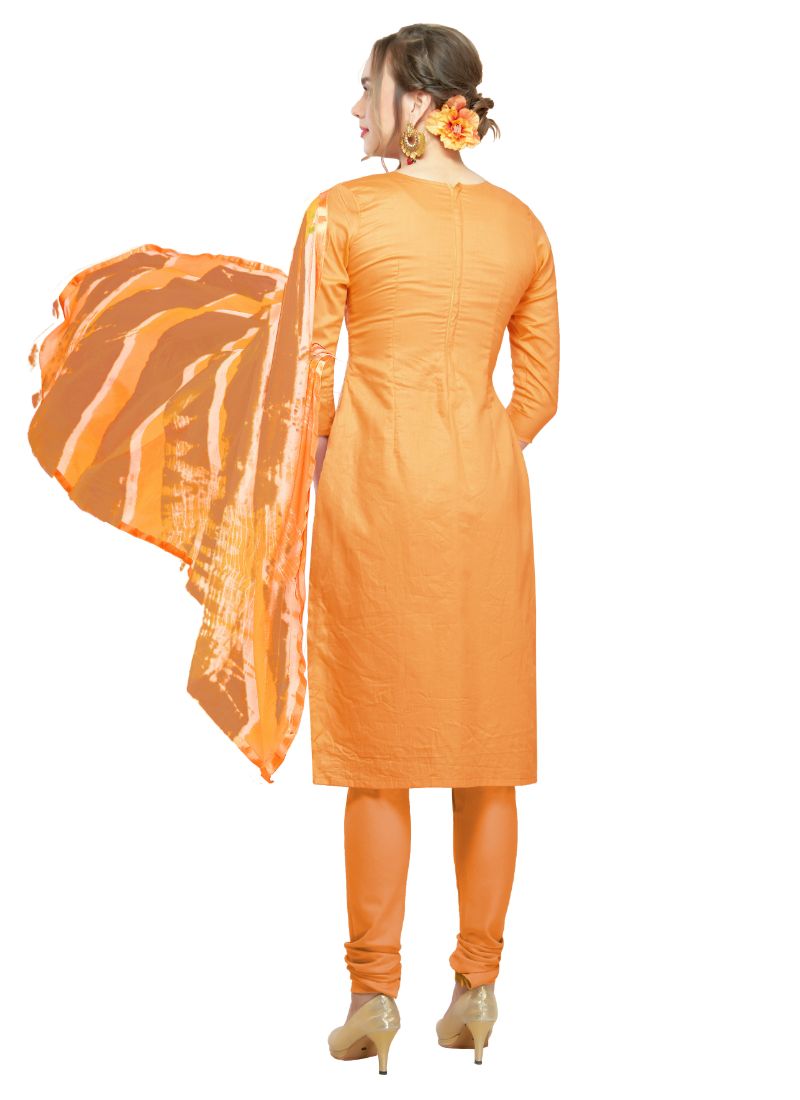 Orange cotton salwar material for women by Ivory Cassiopeia, featuring traditional fabric and design.