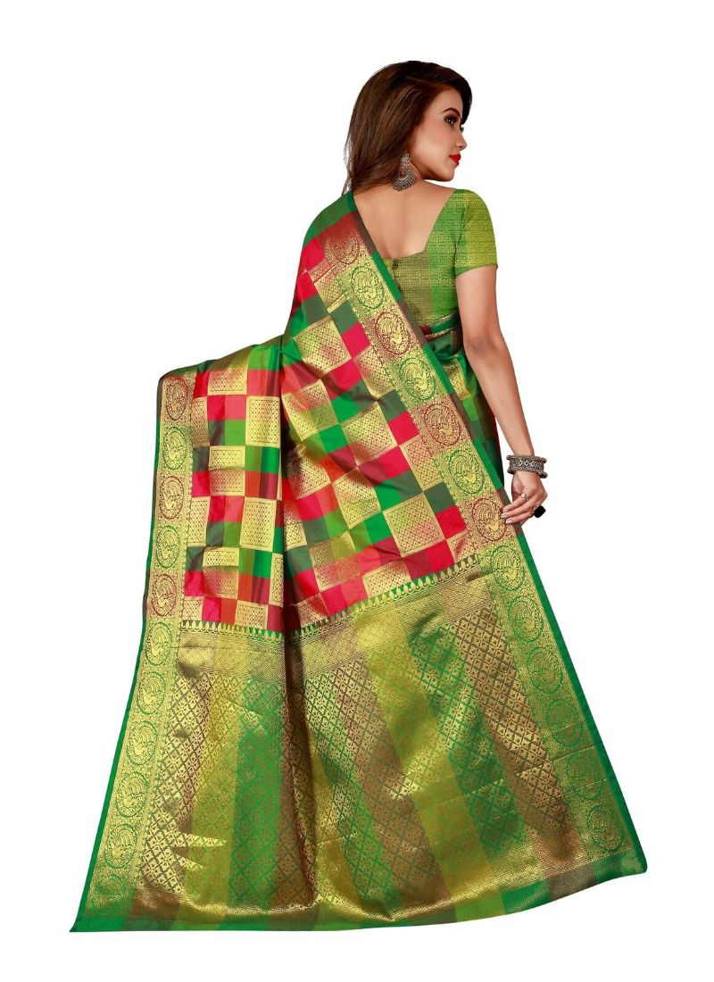 Elegant ivory silk saree with intricate border and matching blouse, worn by a woman, from Ivory Cassiopeia.