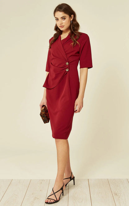 Rose Eleusis Diane Wrap Blazer Dress in black, featuring a tailored fit and classic lapel collar, styled with long sleeves.