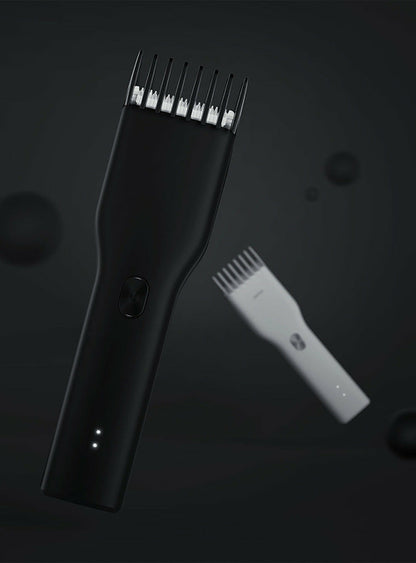Maroon Asteria cordless hair clipper for adults and children, featuring a sleek design and adjustable blades for easy haircutting.