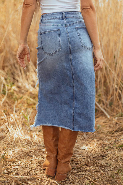 Distressed denim midi skirt for women by Byzantium Bay, showcasing a trendy, casual style with frayed hem and classic blue wash.