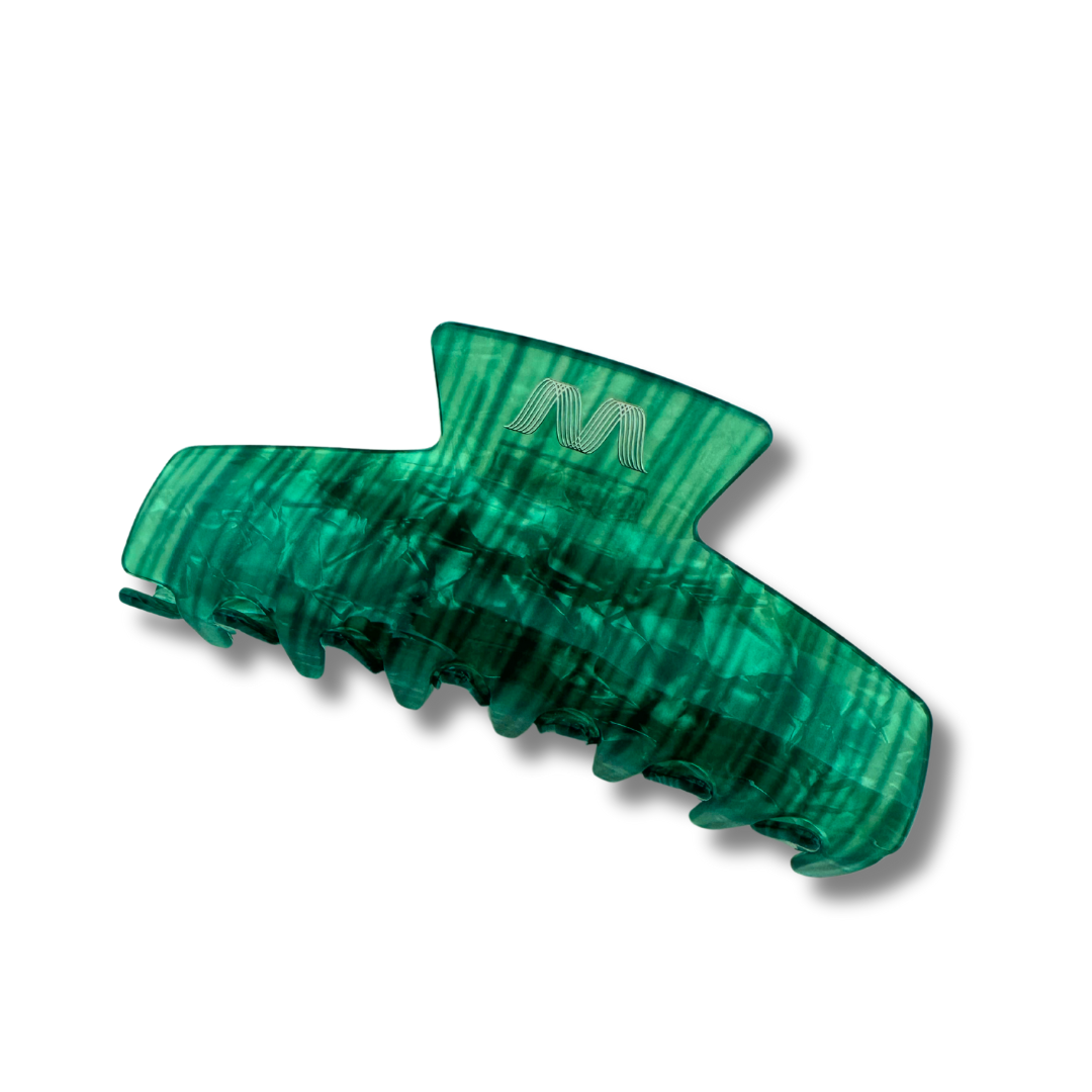 Green Saffron Jade Hair Claw securing hair with a smooth, polished jade finish and ergonomic design.