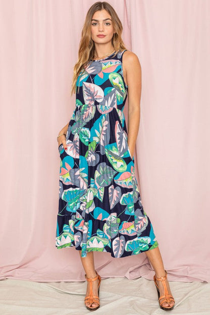 Women’s sleeveless print tea-length dress with ruffled hem by Jade Icarus, featuring a stylish, flowy design for warm weather.