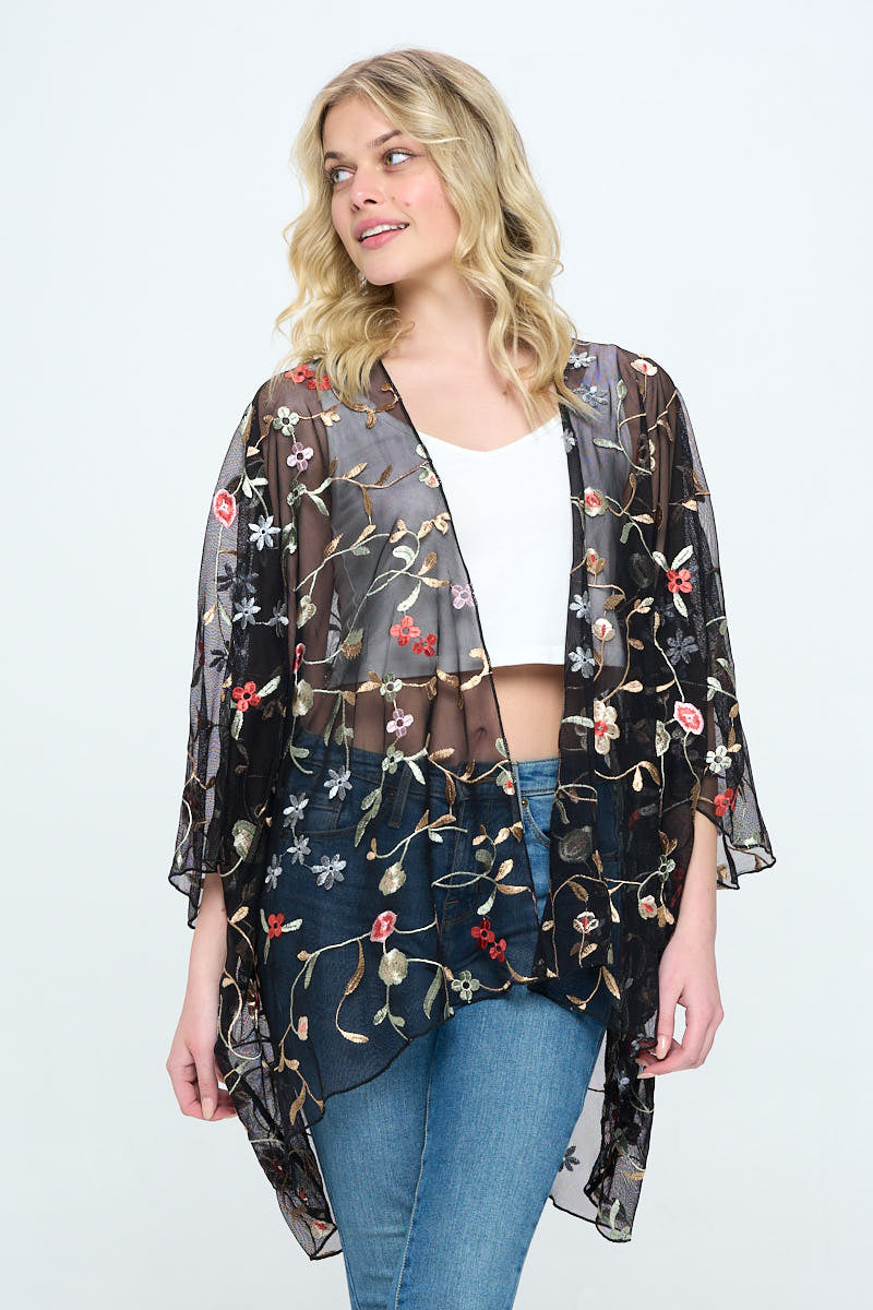 Floral embroidered mesh oversized kimono for women by Indigo Arrowwood, featuring colorful floral patterns and lightweight fabric.