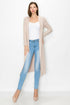 Beige long sleeve hooded light cardigan from Yellow Hera, styled as a comfortable dress with a relaxed fit.