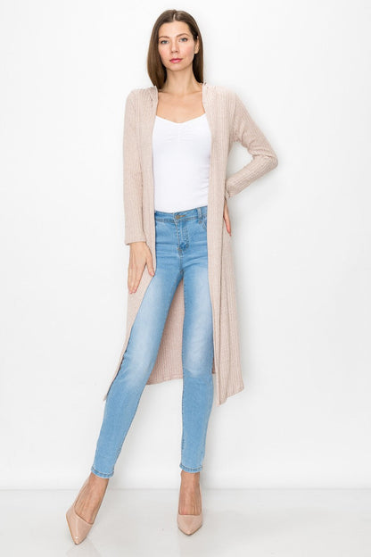 Long sleeve beige hooded light cardigan from Yellow Hera, styled as a dress, with soft fabric and casual fit.