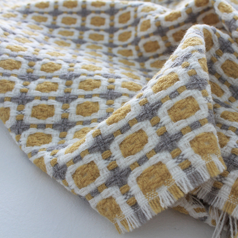 Yellow knitted wool blanket in pastoral style with textured pattern, perfect for cozy home decor from Copper Pallas.