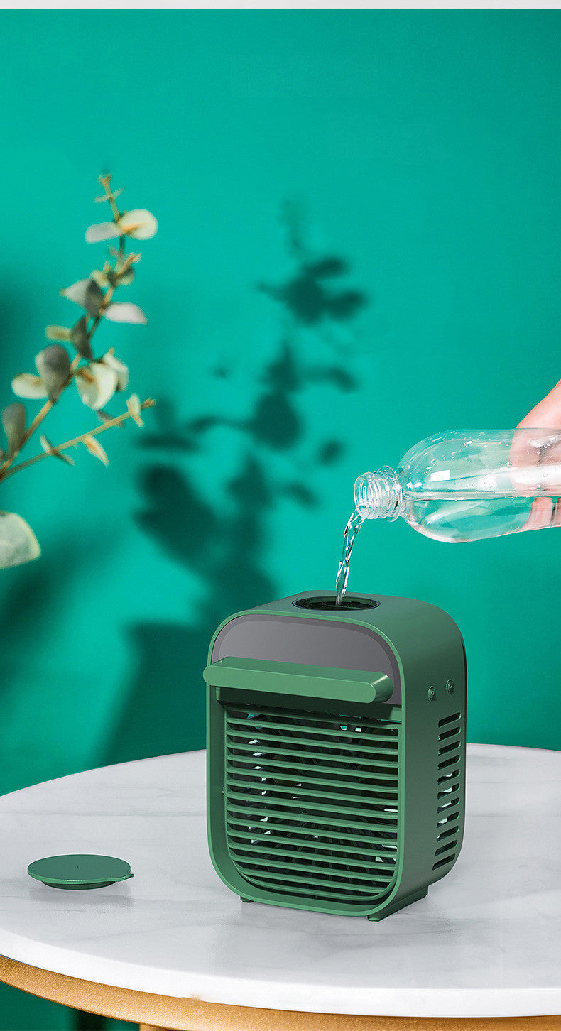 Maroon Asteria small portable USB desktop fan for home and office cooling, compact and easy to use.
