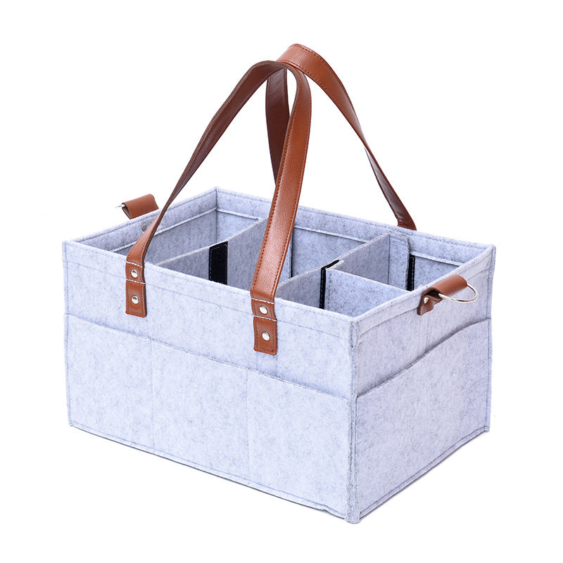 Maroon Asteria large capacity diaper trolley storage bag with multiple compartments and adjustable straps, designed for convenient baby care.