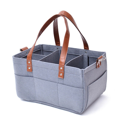 Maroon Asteria large capacity diaper trolley storage bag with multiple compartments for organizing baby essentials.