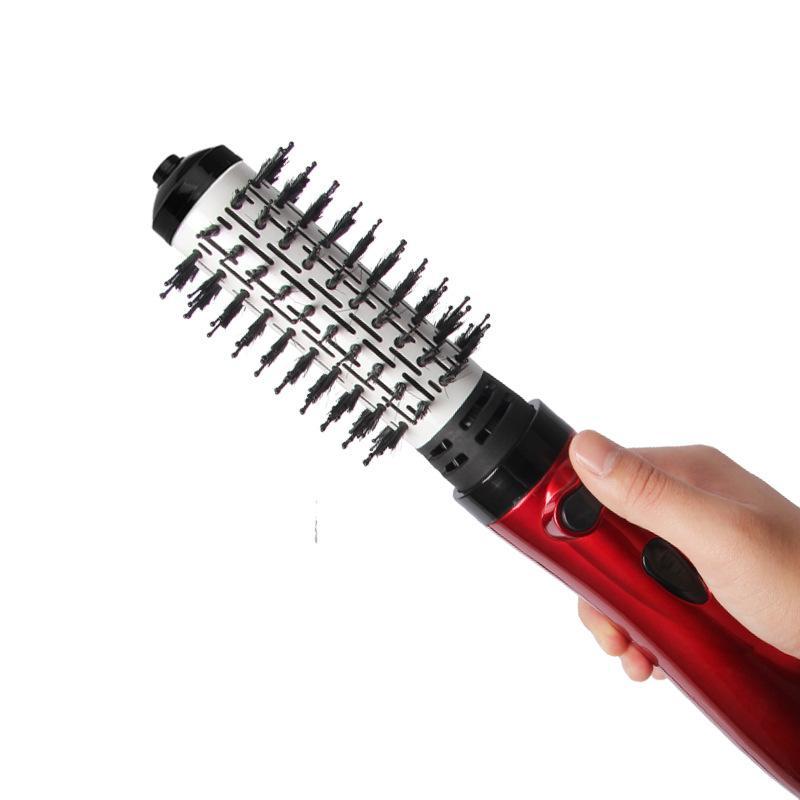 Maroon Asteria two-in-one hot air automatic hair comb for styling and drying hair, featuring a sleek, modern design.