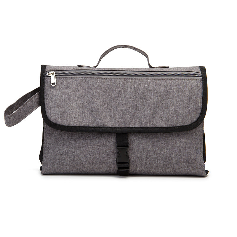 Maroon Asteria multifunction travel waterproof portable diaper change pad with soft surface and adjustable strap for easy carrying.