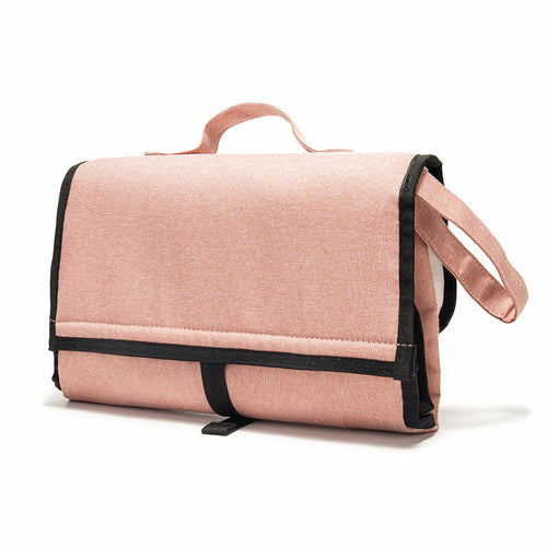 Maroon Asteria waterproof travel diaper change pad with multiple compartments, portable and suitable for parenthood on the go.